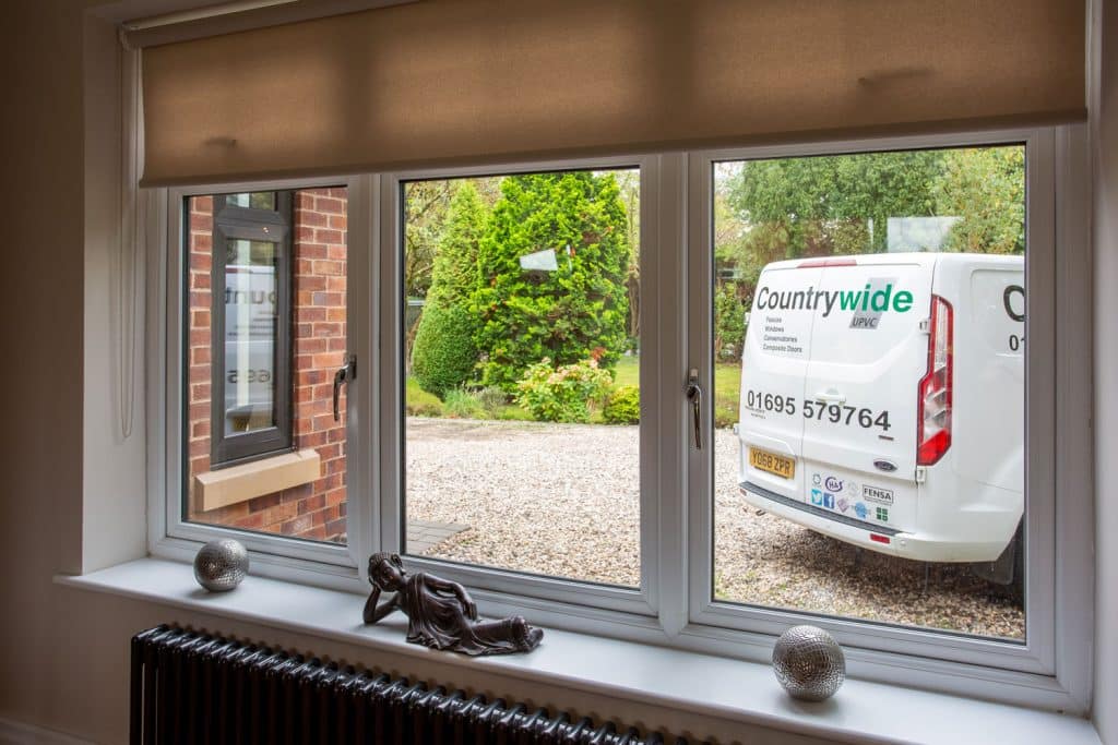 Double glazed aluminium windows with Countrywide van outside