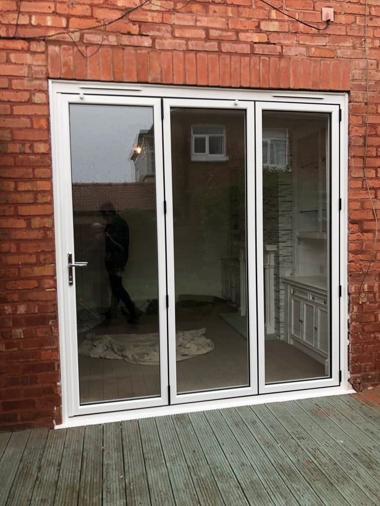 New white bi fold doors